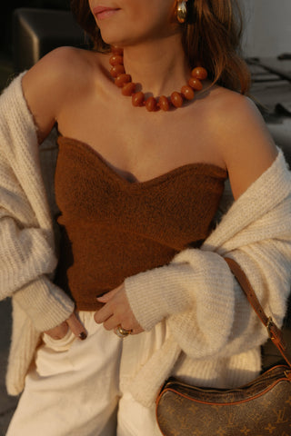 Ambarino Camel Necklace. Spark joy this season with our extra large beaded necklace in a rich camel hue.