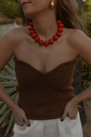 Ambarino Red Necklace. Spark joy this season with our extra large beaded necklace in a rich red hue.