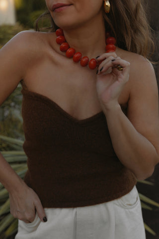 Ambarino Red Necklace. Spark joy this season with our extra large beaded necklace in a rich red hue.