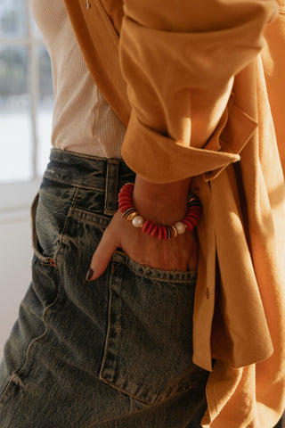 Candy Bracelet Chili. A playful chunky bracelet crafted with red glass beads and freshwater pearls.