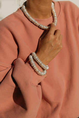 Glace Necklace, accessorize your everyday and special occasion outfits with our timeless piece handcrafted with freshwater disc pearls and gold-plated brass hook closure.