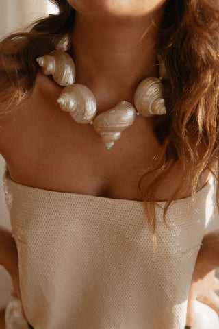 Mermaid Necklace, a statement piece for the season, handcrafted with large turbo seashells. Crafted with love for the ocean.