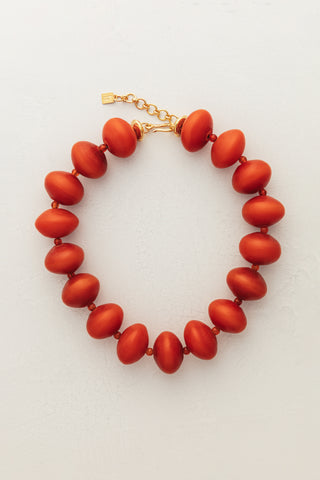 Ambarino Red Necklace. Spark joy this season with our extra large beaded necklace in a rich red hue.