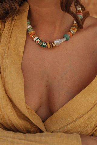 Selva necklace, handcrafted with recycled glass beads, gold-plated accents and a large freshwater baroque pearl.