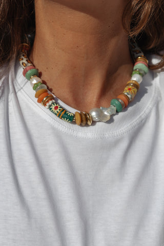 Selva necklace, handcrafted with recycled glass beads, gold-plated accents and a large freshwater baroque pearl.