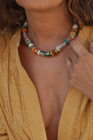 Selva necklace, handcrafted with recycled glass beads, gold-plated accents and a large freshwater baroque pearl.