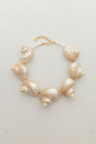 Mermaid Necklace, a statement piece for the season, handcrafted with large turbo seashells. Crafted with love for the ocean.