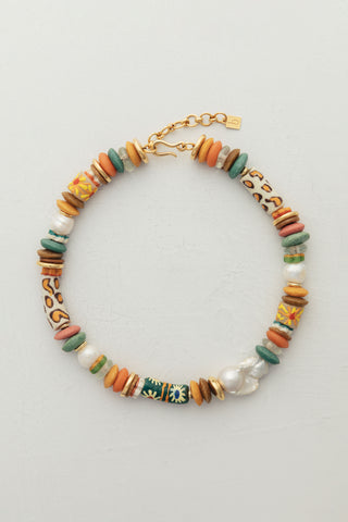 Selva necklace, handcrafted with recycled glass beads, gold-plated accents and a large freshwater baroque pearl.